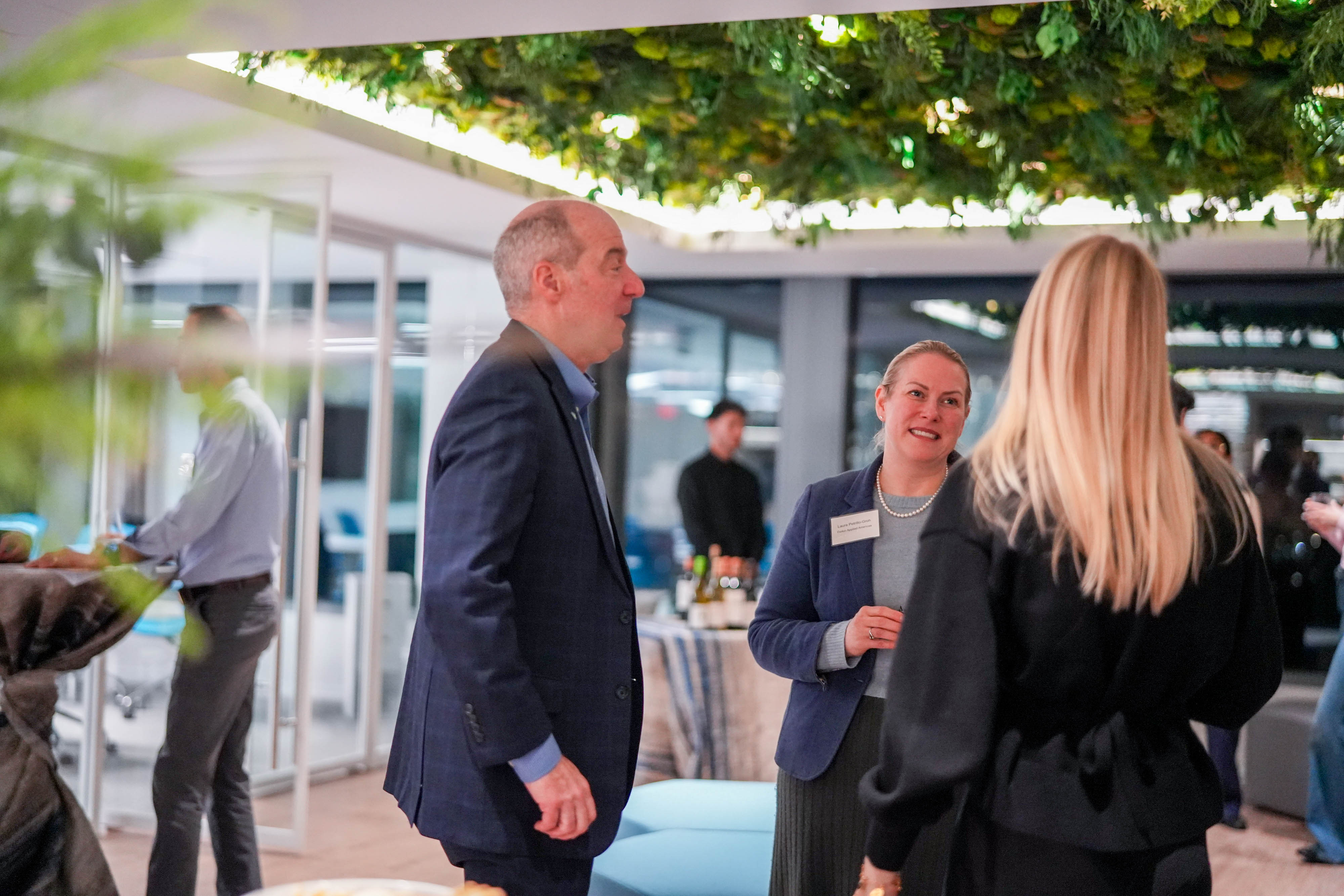 Industry leaders and attendees gather for discussion and networking at Daikin’s DSIC Open House.